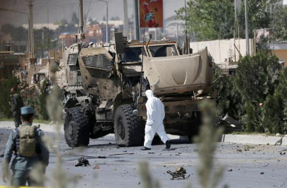 car bomber hits nato convoy in afghanistan civilians wounded