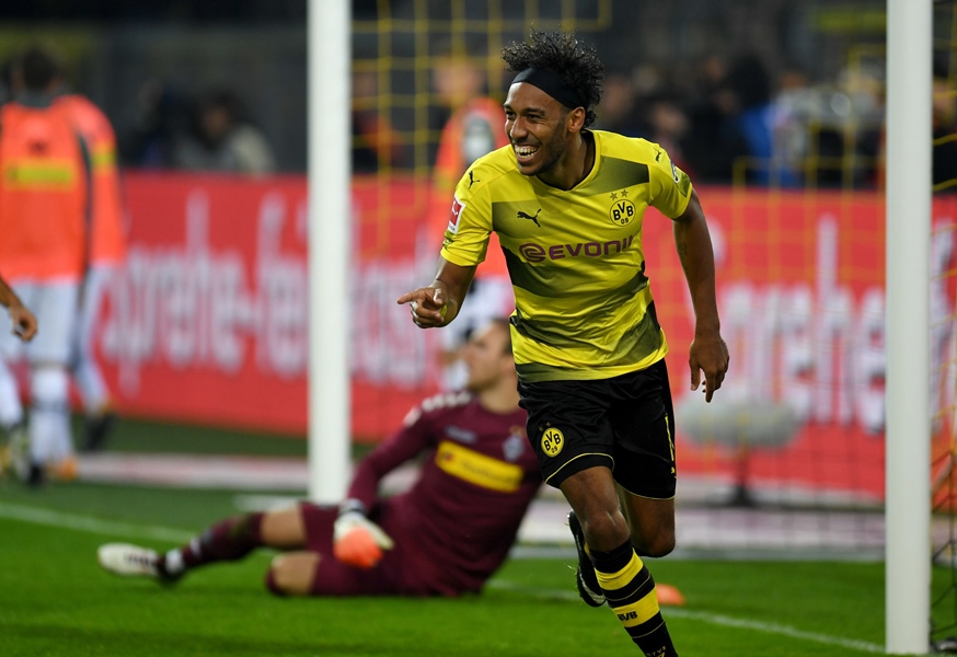 dortmund 039 s gabonese striker pierre emerick aubameyang celebrates scoring during the german first division bundesliga football match borussia dortmund vs borussia moenchengladbach in dortmund western germany on september 23 2017 photo afp