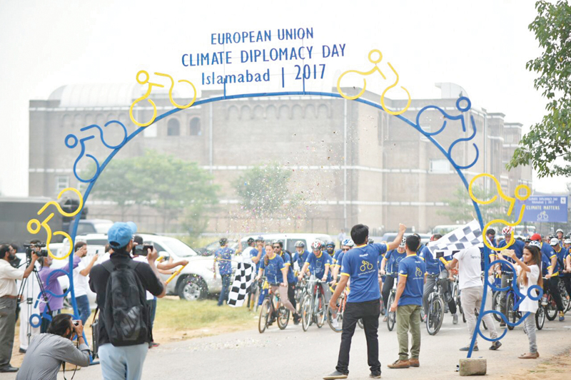 diplomats from the european union wildlife conservationists and environment activists cycle to raise awareness for climate change photos express