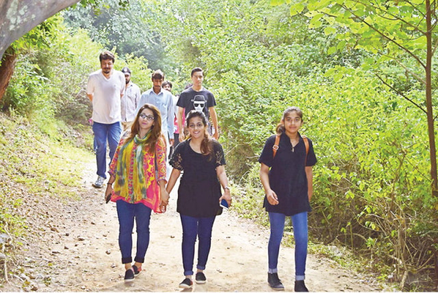 to mark the world heart day doctors students and health conscious people participated in a hike organised by shifa international in islamabad photos express
