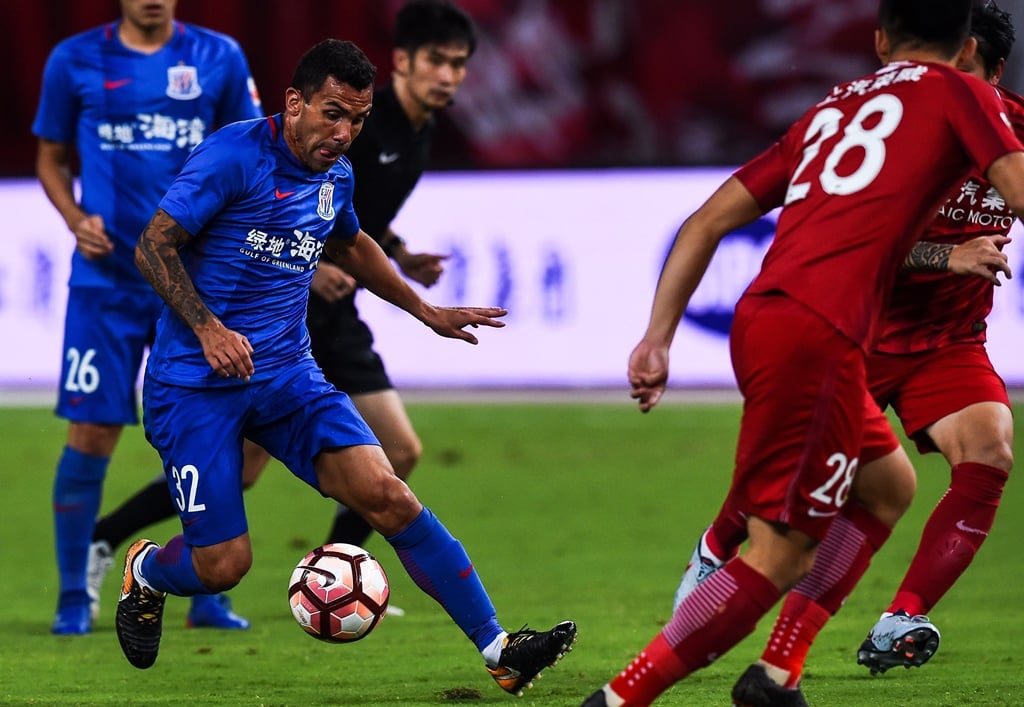 tevez duly scored his third chinese super league csl goal this season but sipg went on to hammer struggling shenhua 6 1 photo afp