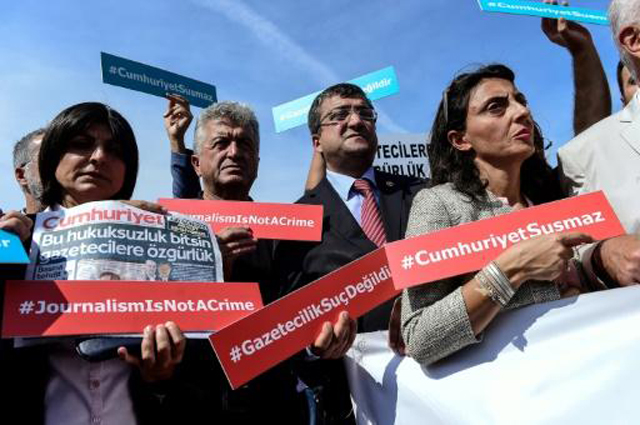 people protest against arrest of journalists photo afp