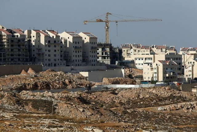 palestinian gunman kills three israelis at settlement police