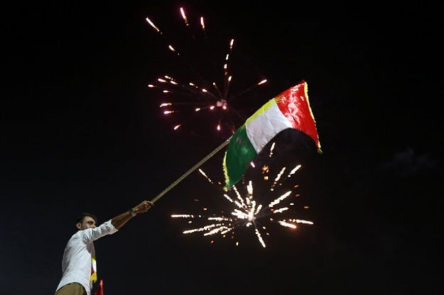 iraqi kurds wave the kurdish flag as they celebrate in the streets of the northern city of arbil photo afp iraqi kurds wave the kurdish flag as they celebrate in the streets of the northern city of arbil photo afp