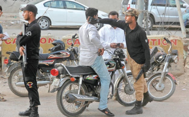 maintaining peace since the start of muharram police and security forces have been extra vigilant in performing checks on the roads and streets of karachi photo athar khan express maintaining peace since the start of muharram police and security forces have been extra vigilant in performing checks on the roads and streets of karachi photo athar khan express
