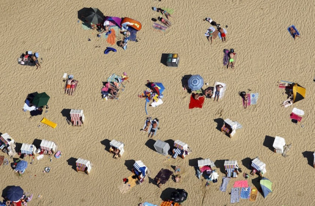 an aerial view shows people relax at a beach on the shores of the silbersee lake on a hot summer day in haltern germany photo reuters an aerial view shows people relax at a beach on the shores of the silbersee lake on a hot summer day in haltern germany photo reuters
