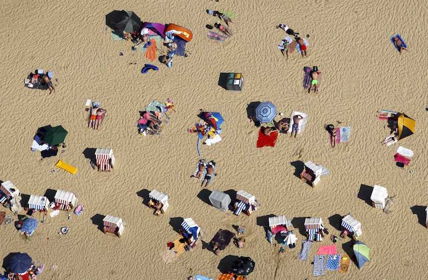 an aerial view shows people relax at a beach on the shores of the silbersee lake on a hot summer day in haltern germany photo reuters