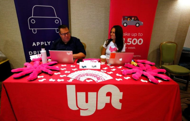 recruiters for lyft wait for the opening of a job fair in golden colorado june 7 2017 photo reuters recruiters for lyft wait for the opening of a job fair in golden colorado june 7 2017 photo reuters