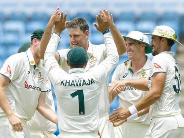 beau webster 3r mitchell starc r and josh hazlewood 2r of australia celebrate the dismissal of kraigg brathwaite of west indies in the 2nd test on sunday photo afp