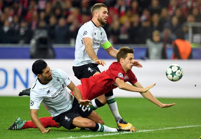 liverpool 039 s midfielder from germany emre can spartak moscow 039 s midfielder from croatia mario pasalic and liverpool 039 s midfielder from england jordan henderson vie for the ball during the uefa champions league group e football match between fc spartak moscow and liverpool fc at the otkrytie arena stadium in moscow on september 26 2017 photo afp liverpool 039 s midfielder from germany emre can spartak moscow 039 s midfielder from croatia mario pasalic and liverpool 039 s midfielder from england jordan henderson vie for the ball during the uefa champions league group e football match between fc spartak moscow and liverpool fc at the otkrytie arena stadium in moscow on september 26 2017 photo afp