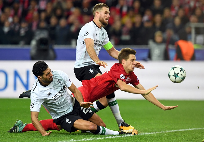 liverpool 039 s midfielder from germany emre can spartak moscow 039 s midfielder from croatia mario pasalic and liverpool 039 s midfielder from england jordan henderson vie for the ball during the uefa champions league group e football match between fc spartak moscow and liverpool fc at the otkrytie arena stadium in moscow on september 26 2017 photo afp