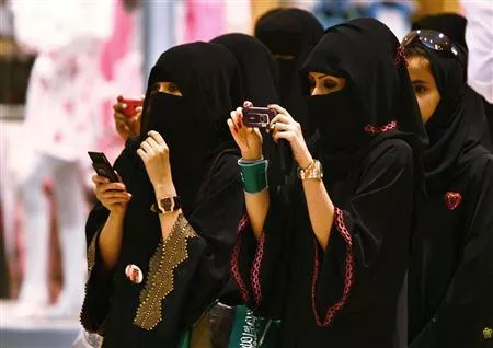 veiled saudi women take photos of their children during a ceremony to celebrate saudi arabia 039 s independence day in riyadh photo reuters veiled saudi women take photos of their children during a ceremony to celebrate saudi arabia 039 s independence day in riyadh photo reuters