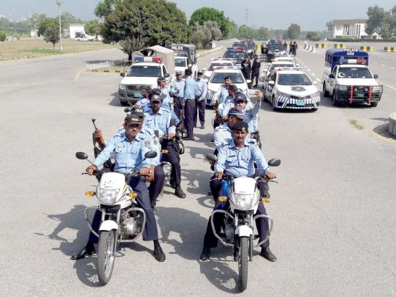 police personnel get ready for a flag march in the capital photo express