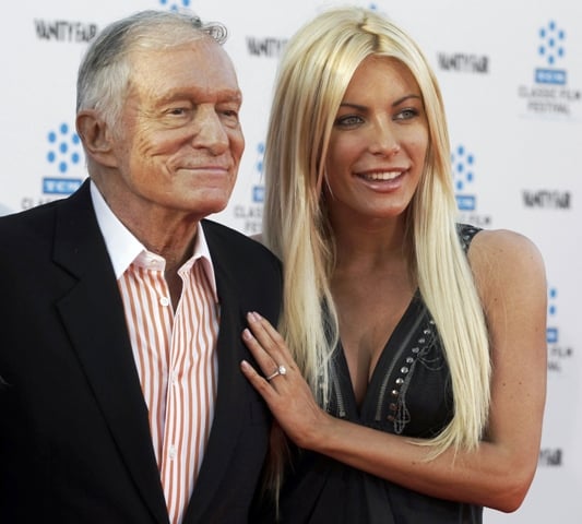 hugh hefner and his fiancee crystal harris arrive at an opening night gala in hollywood california photo reuters