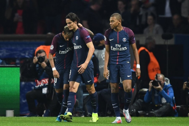 paris saint germain 039 s brazilian forward neymar l is congratulated by paris saint germain 039 s uruguayan forward edinson cavani and paris saint germain 039 s french forward kylian mbappe during the uefa champions league football match between paris saint germain and bayern munich on september 27 2017 at the parc des princes stadium in paris photo afp