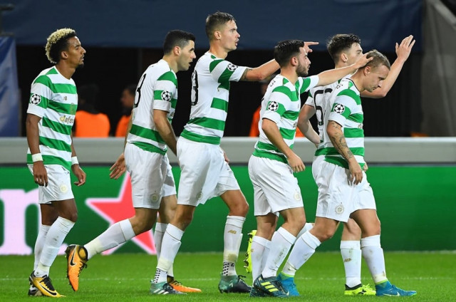 leigh griffiths of celtic fc r celebrates with teammates after scoring during the uefa champions league group b football match anderlecht vs celtic at the constant vanden stock stadium in brussels on september 27 2017 photo afp