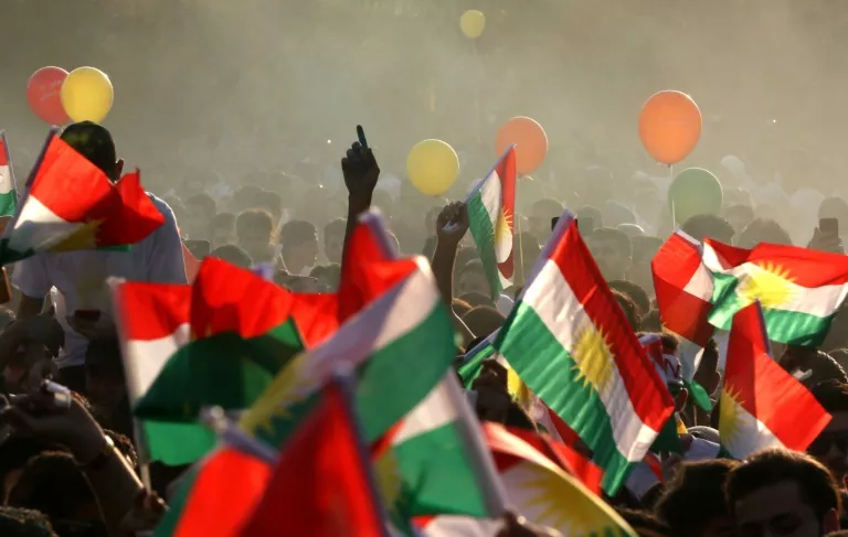 iraqi kurds fly kurdish flags during an event to urge people to vote in the upcoming independence referendum in arbil photo afp iraqi kurds fly kurdish flags during an event to urge people to vote in the upcoming independence referendum in arbil photo afp