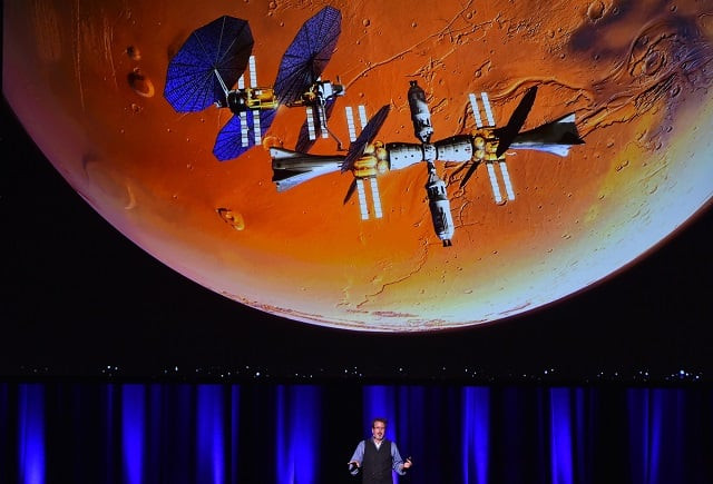 lockheed martin 039 s human spaceflight strategy chief rob chambers speaks during a presentation of a planned mission to mars at the 68th international astronautical congress 2017 in adelaide on september 29 2017 a reusable lander powered by water will allow humans to explore the surface of mars defence giant lockheed martin said on september 29 as it unveiled new details about a push to reach the red planet in about a decade photo afp lockheed martin 039 s human spaceflight strategy chief rob chambers speaks during a presentation of a planned mission to mars at the 68th international astronautical congress 2017 in adelaide on september 29 2017 a reusable lander powered by water will allow humans to explore the surface of mars defence giant lockheed martin said on september 29 as it unveiled new details about a push to reach the red planet in about a decade photo afp