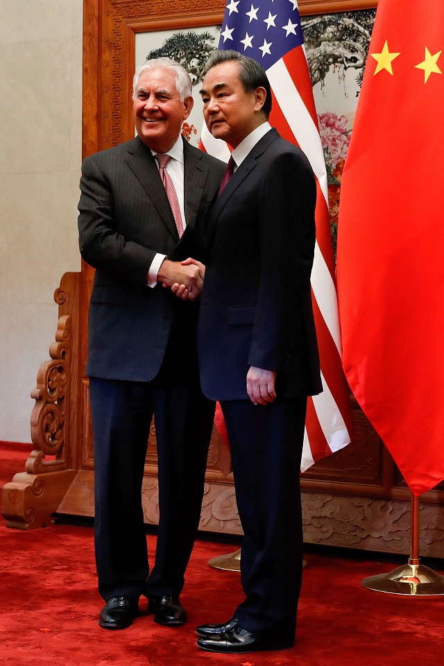 us secretary of state rex tillerson l shakes hands with chinese foreign minister wang yi before a meeting at the great hall of the people in beijing on september 30 2017 tillerson met with china 039 s foreign minister in beijing on september 30 to discuss efforts to curb north korea 039 s nuclear ambitions and prepare president donald trump 039 s november visit photo afp