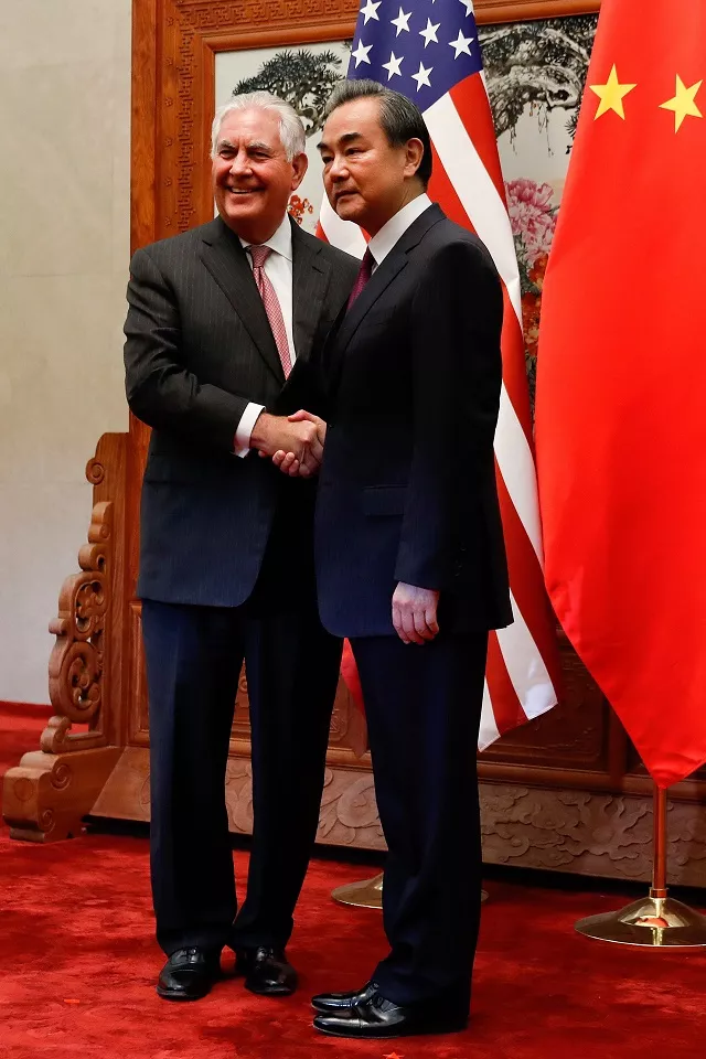 us secretary of state rex tillerson l shakes hands with chinese foreign minister wang yi before a meeting at the great hall of the people in beijing on september 30 2017 tillerson met with china 039 s foreign minister in beijing on september 30 to discuss efforts to curb north korea 039 s nuclear ambitions and prepare president donald trump 039 s november visit photo afp us secretary of state rex tillerson l shakes hands with chinese foreign minister wang yi before a meeting at the great hall of the people in beijing on september 30 2017 tillerson met with china 039 s foreign minister in beijing on september 30 to discuss efforts to curb north korea 039 s nuclear ambitions and prepare president donald trump 039 s november visit photo afp