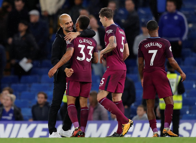 manchester city manager pep guardiola with manchester city 039 s gabriel jesus after the match against chelsea on september 30 2017 photo reuters