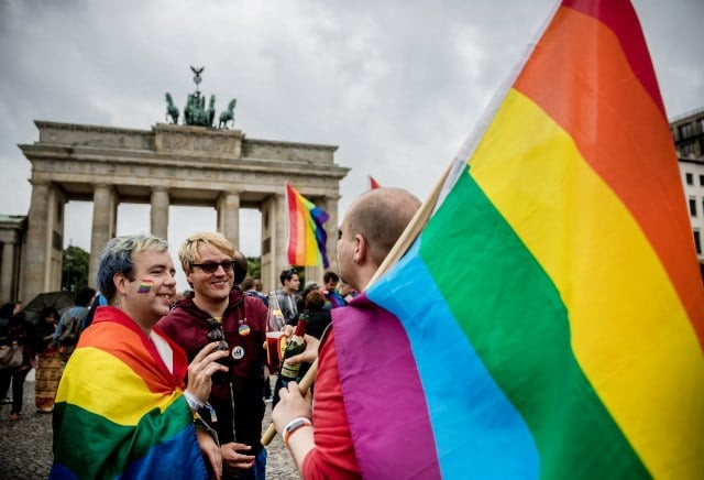 two german men made history by saying quot i do quot and becoming the first same sex couple to marry after decades of struggle photo afp
