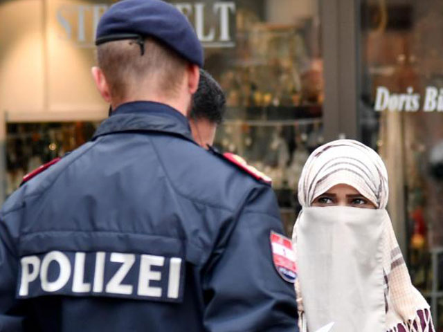 a woman pictured wearing a niqab in austrian town zell am see photo afp