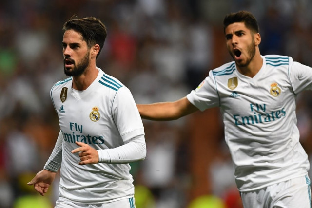 real madrid 039 s midfielder isco l celebrates his second goal during the spanish league football match real madrid cf vs rcd espanyol at the santiago bernabeu stadium in madrid on october 1 2017 photo afp real madrid 039 s midfielder isco l celebrates his second goal during the spanish league football match real madrid cf vs rcd espanyol at the santiago bernabeu stadium in madrid on october 1 2017 photo afp