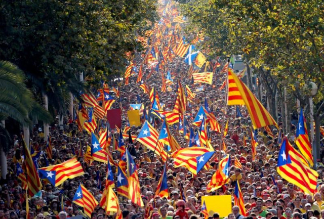 people hold catalan separatist flags known as quot esteladas quot during a gathering to mark the calatalonia day quot diada quot in central barcelona spain photo reuters people hold catalan separatist flags known as quot esteladas quot during a gathering to mark the calatalonia day quot diada quot in central barcelona spain photo reuters