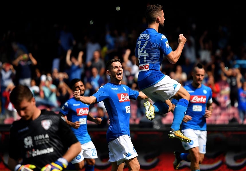 napoli 039 s belgian striker dries mertens top celebrates after scoring a penalty kick during the italian serie a football match napoli vs cagliari on october 1 2017 at san paolo stadium in naples photo afp