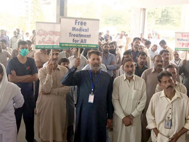 paramedical staff of pims hold a protest against separation from the university photo express paramedical staff of pims hold a protest against separation from the university photo express