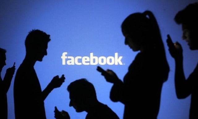 people are silhouetted as they pose with mobile devices in front of a screen projected with a facebook logo in this picture illustration taken in zenica october 29 2014 photo reuters people are silhouetted as they pose with mobile devices in front of a screen projected with a facebook logo in this picture illustration taken in zenica october 29 2014 photo reuters