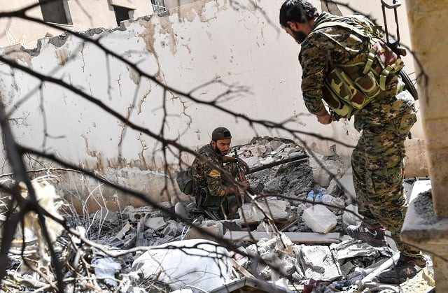 members of the syrian democratic forces sdf syrian fighters backed by us special forces search newly taken areas near the central hospital of raqa on october 2 2017 sdf are battling to clear the last remaining islamic state group jihadists holed up in their crumbling stronghold of raqa photo afp members of the syrian democratic forces sdf syrian fighters backed by us special forces search newly taken areas near the central hospital of raqa on october 2 2017 sdf are battling to clear the last remaining islamic state group jihadists holed up in their crumbling stronghold of raqa photo afp