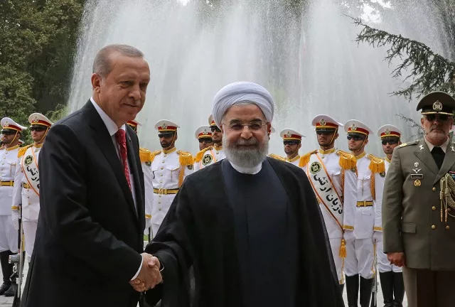 a handout picture provided by the iranian presidency shows iran 039 s president hassan rouhani r shaking hands with turkish president recep tayyip erdogan during a welcome ceremony in tehran on october 4 2017 erdogan is visiting iran in a sign of warming ties between the two neighbours which support rival camps in syria but both strongly oppose last week 039 s iraqi kurdish vote for independence photo afp a handout picture provided by the iranian presidency shows iran 039 s president hassan rouhani r shaking hands with turkish president recep tayyip erdogan during a welcome ceremony in tehran on october 4 2017 erdogan is visiting iran in a sign of warming ties between the two neighbours which support rival camps in syria but both strongly oppose last week 039 s iraqi kurdish vote for independence photo afp