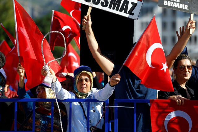 supporters of president erdogan wave turkish flags during a trial for soldiers accused of attempting to assassinate the president on the night of the failed last year 039 s july 15 coup in mugla turkey october 4 2017 photo reuters supporters of president erdogan wave turkish flags during a trial for soldiers accused of attempting to assassinate the president on the night of the failed last year 039 s july 15 coup in mugla turkey october 4 2017 photo reuters