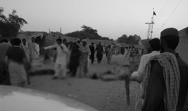 devotees gather around the bodies of blast victims after a suicide bombing near a sufi shrine in the gandawa area of jhal magsi district of balochistan on october 5 2017 photo afp devotees gather around the bodies of blast victims after a suicide bombing near a sufi shrine in the gandawa area of jhal magsi district of balochistan on october 5 2017 photo afp