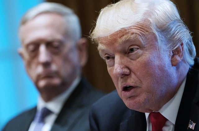 us president donald trump speaks as defense secretary james mattis l looks on during a meeting with senior military leaders in the cabinet room of the white house on october 5 2017 photo afp