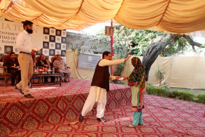 august 27 conflagration bahria town distributes cheques among affectees august 27 conflagration bahria town distributes cheques among affectees