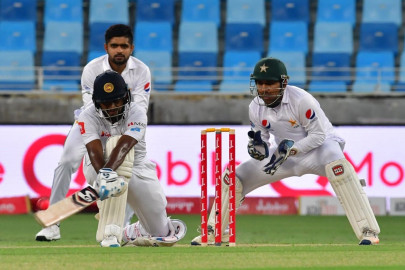 second test karunaratne ton pushes pakistan on back foot