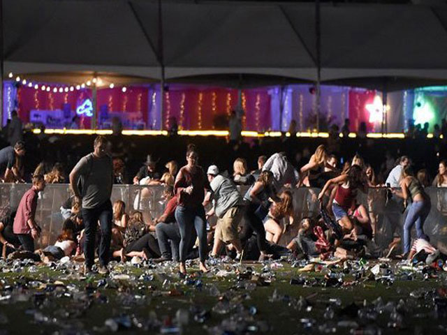 people run from the route 91 harvest country music festival after apparent gun fire was heard on october 1 2017 in las vegas nevada photo afp