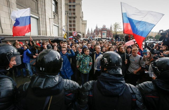 police officers block supporters of russian opposition leader alexei navalny during a rally in moscow russia october 7 2017 reuters sergei karpukhin police officers block supporters of russian opposition leader alexei navalny during a rally in moscow russia october 7 2017 reuters sergei karpukhin