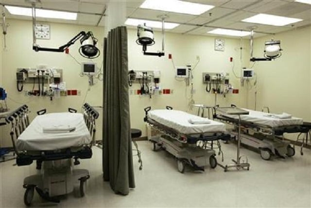 beds lie empty in emergency room photo reuters beds lie empty in emergency room photo reuters