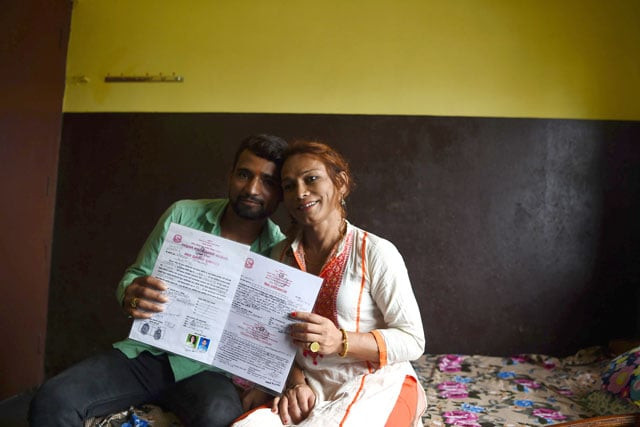 this photo taken on august 3 2017 shows nepali transgender person monika shahi nath and her husband ramesh nath yogi holding their marriage certificate in kathmandu photo afp this photo taken on august 3 2017 shows nepali transgender person monika shahi nath and her husband ramesh nath yogi holding their marriage certificate in kathmandu photo afp