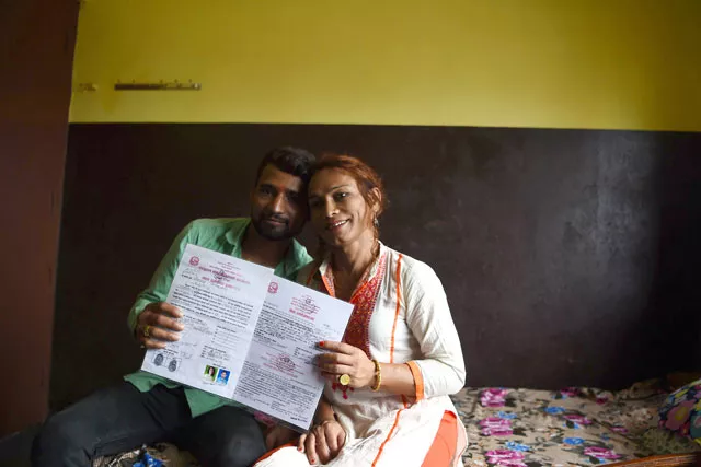 this photo taken on august 3 2017 shows nepali transgender person monika shahi nath and her husband ramesh nath yogi holding their marriage certificate in kathmandu photo afp this photo taken on august 3 2017 shows nepali transgender person monika shahi nath and her husband ramesh nath yogi holding their marriage certificate in kathmandu photo afp