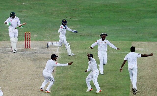 sri lankan players celebrate the dismissal of azhar ali photo afp