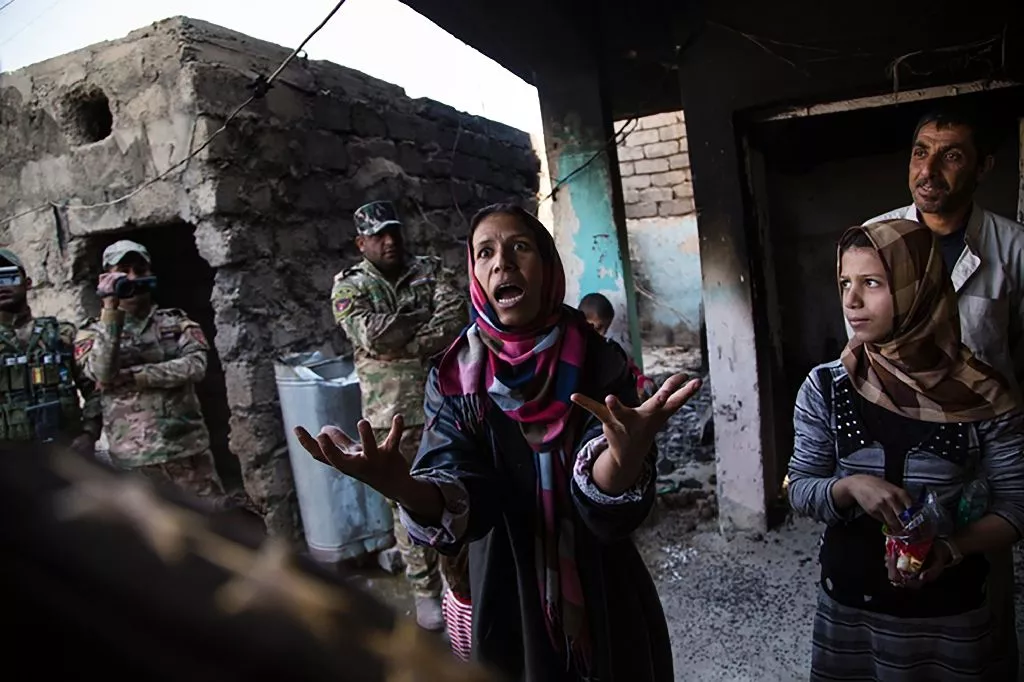 one of arkady 039 s powerful images this one taken last november shows a woman talking to an erd intelligence officer after her house was bombed by iraqi air strikes and her brother kidnapped by isis in qabr al abd village near mosul photo afp one of arkady 039 s powerful images this one taken last november shows a woman talking to an erd intelligence officer after her house was bombed by iraqi air strikes and her brother kidnapped by isis in qabr al abd village near mosul photo afp