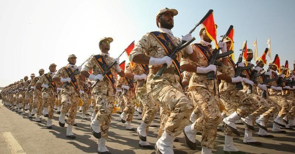 members of the iranian revolutionary guard march during a parade to commemorate the anniversary of the iran iraq war 1980 88 in tehran photo reuters