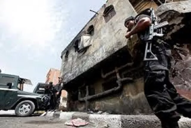 police officers stand in front of a police station damaged after being set ablaze in august by supporters of former president mohamed mursi in kerdasa 9 miles from cairo september 19 2013 photo reuters police officers stand in front of a police station damaged after being set ablaze in august by supporters of former president mohamed mursi in kerdasa 9 miles from cairo september 19 2013 photo reuters