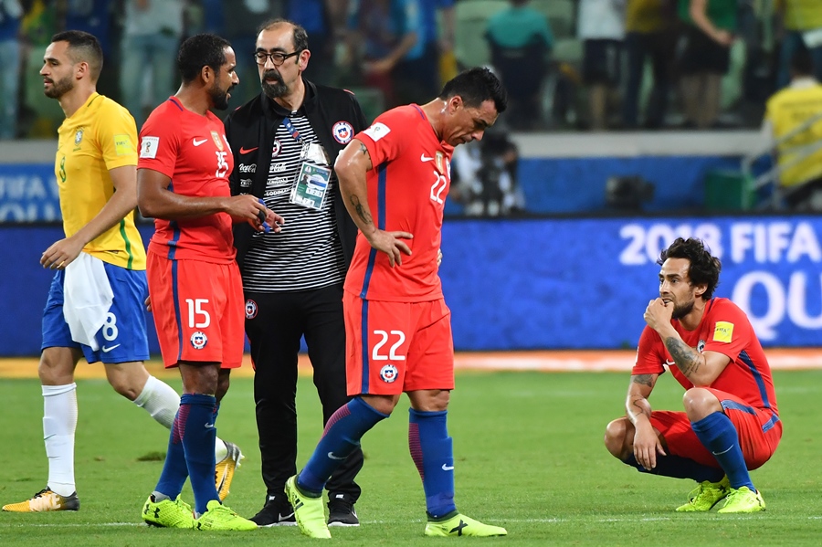 chile 039 s jean beausejour 2 l esteban paredes c and jorge valdivia r show their dejection after being defeated by brazil in a qualifier match and missing the 2018 world cup football tournament in sao paulo brazil on october 10 2017 photo afp