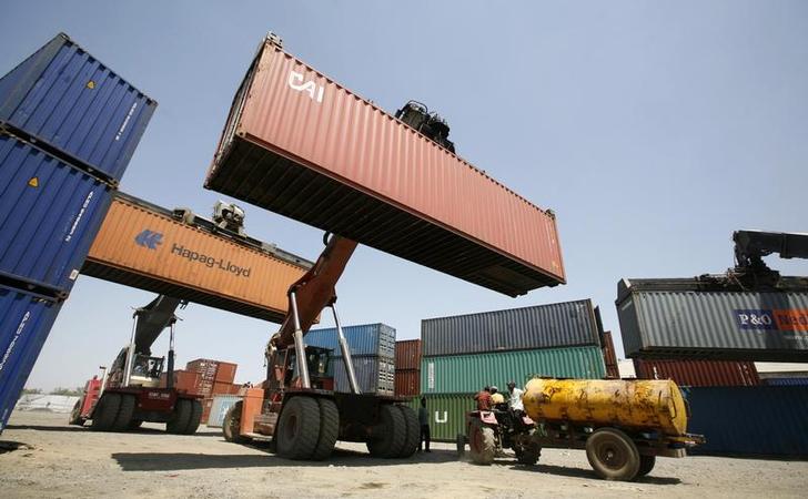 mobile cranes prepare to stack containers port photo reuters